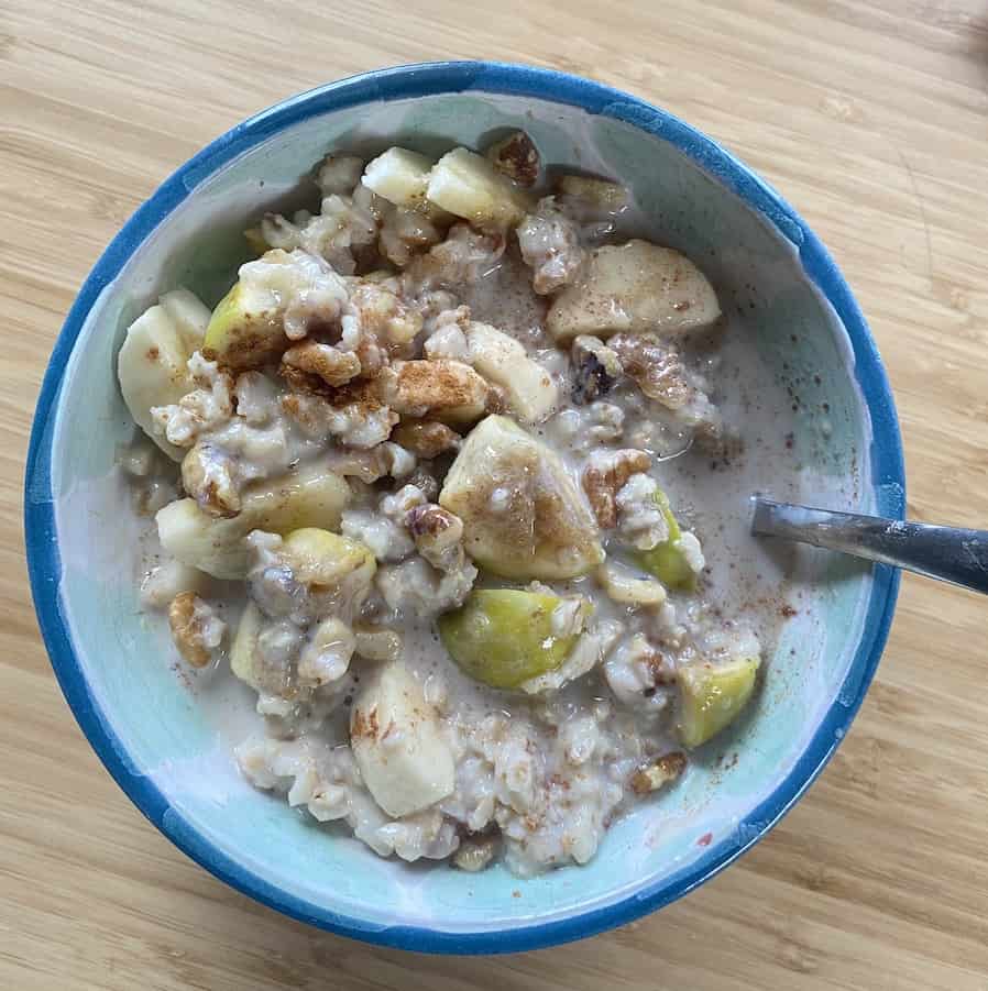 oatmeal with fruit, walnuts, and cinnamon